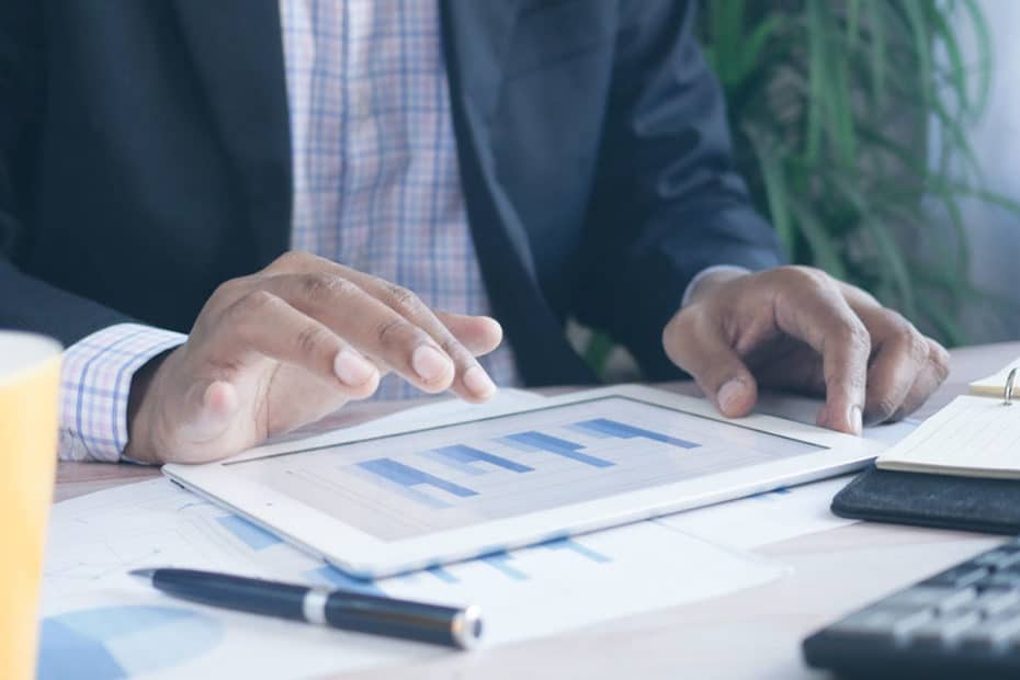 Man checking financial pillars on ipad