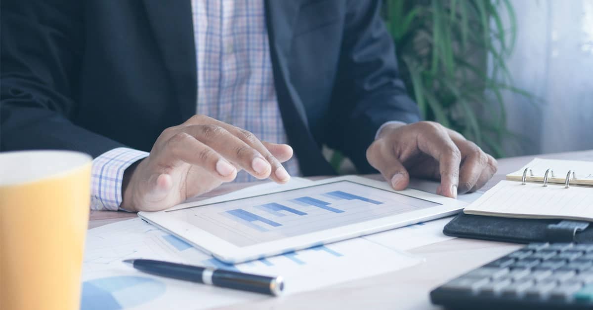 Man checking financial pillars on ipad