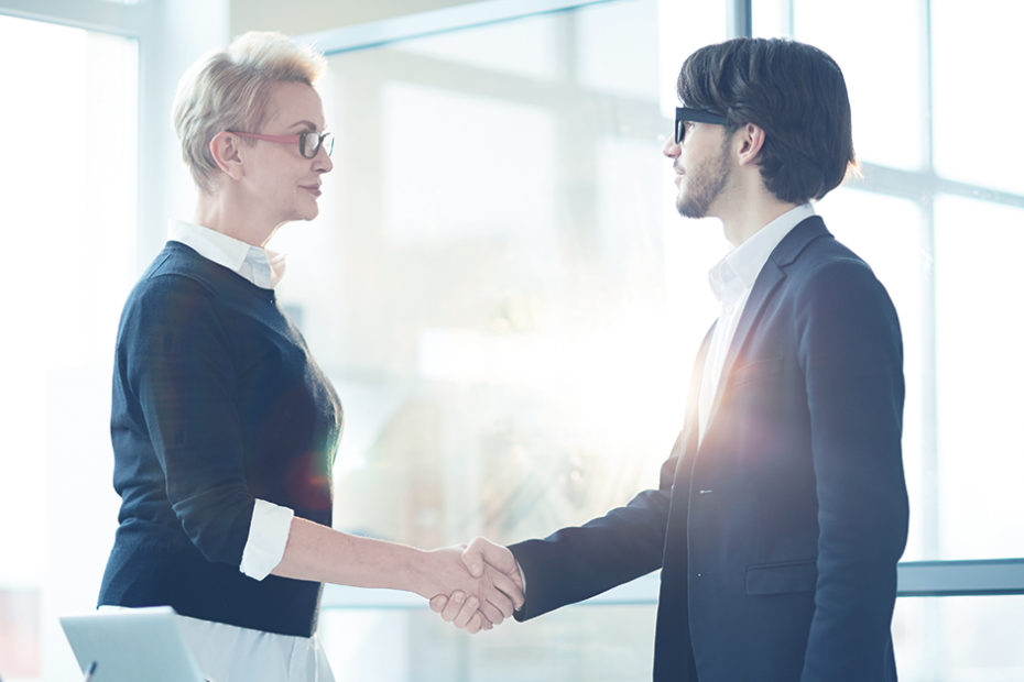 client and business owner shaking hands during onboarding - Scrubbed 2022